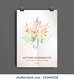 Vector template. Sheet of paper folded in four. The paper hangs on the clamps. Decorative autumn maple leaf. Vector drawing freehand.