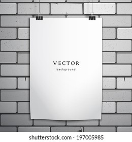 Vector template.  Sheet of paper hangs on the clamps. Brick wall. White paper where you can place your text. 