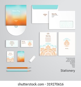 Vector templates with autumn tree in the rain and decorative leaves, birds and soil. Bright colored background. Envelope, cards, business cards, tags, disc with packaging, pencils, eraser.