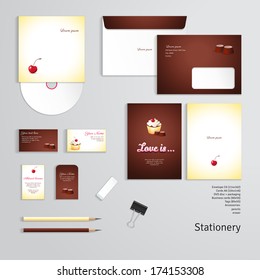 Vector templates. Beautiful inscription "Love is ..." Cupcake with cherry and cream and chocolate candies. Envelope, cards, business cards, tags, disc with packaging, pencils, eraser, clamp