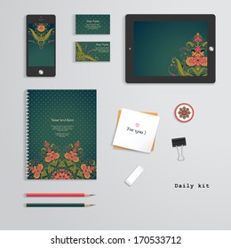 Vector templates. Daily kit. Floral pattern in vintage style. Bright colors and dark background. Tablet computer, phone, business cards, notebook, pencils, eraser, clamp, sticker.