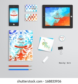Vector templates  Daily kit  Geometric   watercolor pattern  Tablet computer  phone  business cards  notebook  pencils  eraser  clamp  sticker  Inscription in retro style    Tuesday is an action day