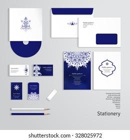 Vector templates with floral damask pattern. Envelope, cards, business cards, tags, disc with packaging, pencils, eraser.