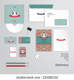 Vector templates. Geometric pattern. Emblem with two goats and ribbon for your text. Envelope, cards, business cards, tags, disc with packaging, pencils, eraser, clamp. 