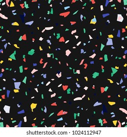 Vector terrazzo floor seamless pattern. Fashion marble abstract on black background. Hand drawn pop art confetti in memphis style.