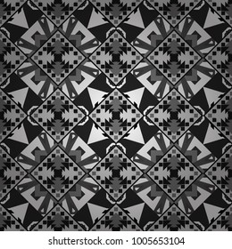 Vector textile print for bed linen, jacket, package design, fabric and fashion concepts. Seamless pattern ethnic design in gray, black and white colors. Geometric background with tribal tiles.