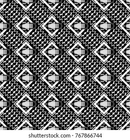 Vector textile print for bed linen, jacket, package design, fabric and fashion concepts. Seamless pattern ethnic design in black, white and gray colors. Geometric background with tribal tiles.