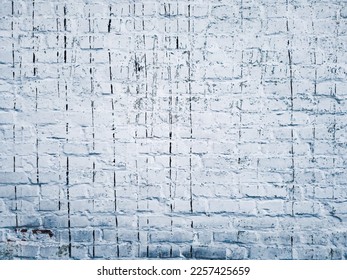 Vector texture of an old dirty brick wall painted white. Original illustration with damage and streaks of black resin for the designer. Close-up of a wall of carelessly laid bricks