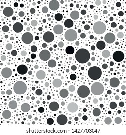 Vector texture of randomly arranged isolated gray circles of various sizes and shades