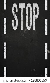 Vector textured asphalt road with cracked white dashed marking and stop sign