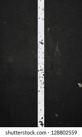 Vector textured asphalt road with cracked white marking
