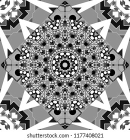 Vector textured background. Abstract seamless pattern of a plurality stylized elements in white, gray and black colors.