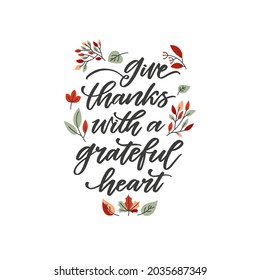 Vector thanksgiving day poster - Give thanks with a grateful heart. Hand written calligraphy isolated on white background with autumn leaves