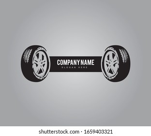 Logotipo de la empresa de neumáticos vectores, diseño del logotipo de la tienda de neumáticos, logotipo de neumáticos de color negro sobre fondo gris