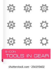 Vector tools in gear icon set on grey background