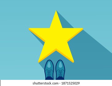 Vector top view of a business man in shoes standing in front of a golden star 