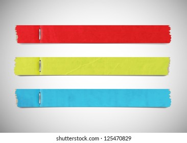 Vector torn colored paper banners with staples