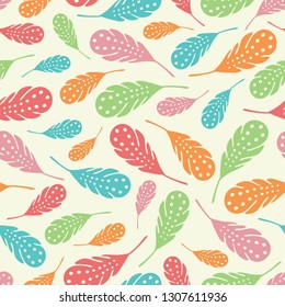 Vector tossed colourful feathers seamless repeat pattern background.