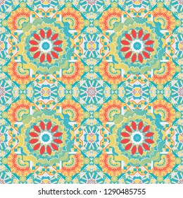 Vector traditional ethnic background in yellow, brown and blue colors. Ornament consisting of mandalas. Seamless geometric arabesque oriental pattern.