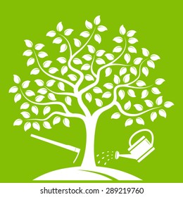 vector tree with hoe and watering can isolated on green background