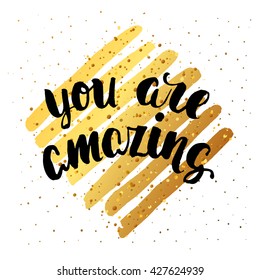 Vector trendy hand lettering poster. Hand drawn calligraphy ' you are amazing ' Template poster  on gold  lines