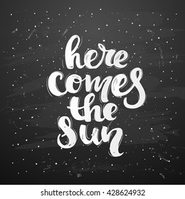 Vector trendy hand lettering poster. Hand drawn calligraphy ' here comes the sun ' Template post card on black background. concept handwritten poster. chalkboard art 