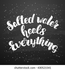Vector trendy hand lettering poster. Hand drawn calligraphy ' salted water heals everything '  Template post card on black background. concept handwritten poster. chalkboard art