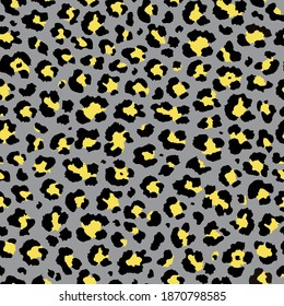 Vector trendy yellow and gray colors leopard seamless pattern. Abstract ornament of cheetah or ounce predatory print. Modern animal fur fashion background. Exotic wild leopard animal skin pattern.