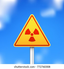 Vector triangle radiation sign on blue sky background