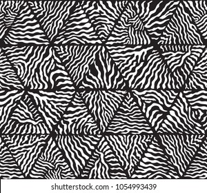 Vector triangular patchwork seamless pattern from hand drawn Zebra stripes . Black and white animal print. Batik paint, wallpaper décor, 90-th fashion textile patch, wrapping paper, web page fill