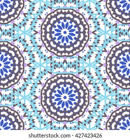 Vector tribal colorful bohemian pattern with big abstract flowers in soft blue color. Geometric boho chic background with Arabic, Indian, Moroccan, Aztec ethnic motifs. Bold ethnic print with mandalas