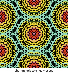 Vector tribal colorful bohemian pattern with big abstract flowers in bright colors. Geometric boho chic background with Arabic, Indian, Moroccan, Aztec ethnic motifs. Bold ethnic print with mandalas