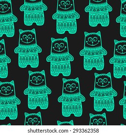 Vector tribal indian pattern with doodle cat. Hand drawn animal with ornament. Seamless. Mint objects on black background.
