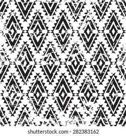 Vector tribal ornament grunge seamless pattern. Abstract black and white aztec geometric texture background.
