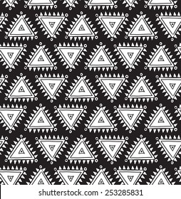 Vector tribal seamless pattern with triangles. Geometric background