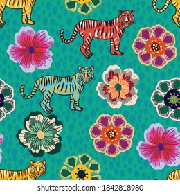 Vector tropical flowers and tigers seamless pattern background.