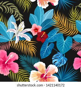 Vector tropical jungle seamless pattern with flowers, palm trees, leaves monstera on black background