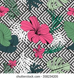 Vector tropical seamless pattern, geometric black and white background, decorated with palm leaves and flowers. 
