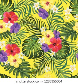 	
Vector tropical seamless pattern with hibiscus flowers and palm leaves.