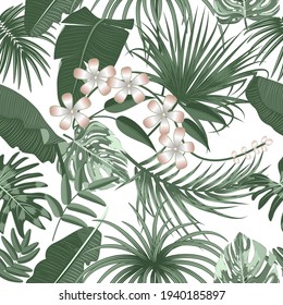 Vector tropical seamless pattern with  leaves of palm tree and flowers. Botany light background, jungle  wallpaper.