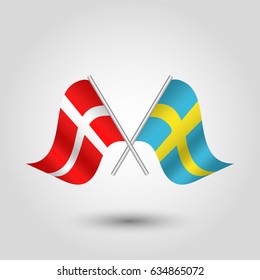 vector two crossed danish and swedish flags on silver sticks - symbol of denmark and sweden