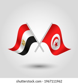 vector two crossed egyptian and tunisian flags on silver sticks - symbol of egypt and tunisia