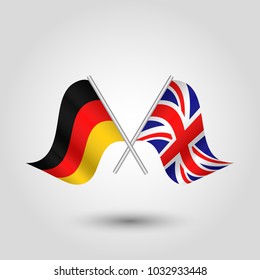 vector two crossed german and british flags on silver sticks - symbol of united kingdom and germany 