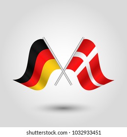vector two crossed german and danish flags on silver sticks - symbol of germany and denmark 