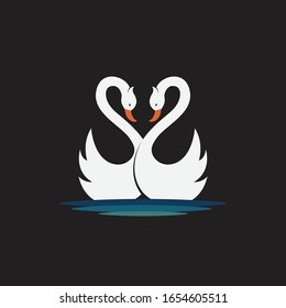 Vector of two white swan design on black background. Wild Animals. Birds. Easy editable layered vector illustration.