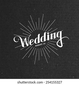 vector typographic illustration of handwritten Wedding retro label with light rays or burst on the black cardboard background. ceremony invitation logo