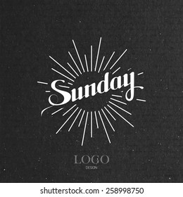 vector typographical illustration with ornate word Sunday and light rays on the black cardboard texture