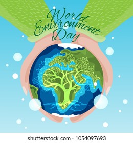 Vector typography motivational and inspirational poster with the planet Earth in human hands,tree silhouette and text: World Environment Day