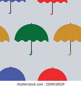 Patrón de paraguas vectorial. Paraguas coloridos sobre fondo gris