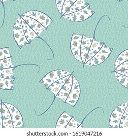 Vector Umbrellas with Printed Leaves on Aqua Green Background with Rain Drops Seamless Repeat Pattern. Background for textiles, cards, manufacturing, wallpapers, print, gift wrap and scrapbooking.